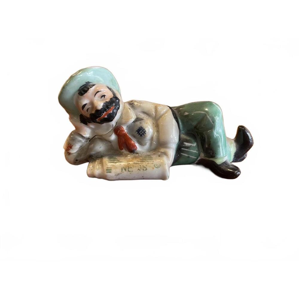 Vintage Bisque Ceramic Figurine of a Man Relaxing with a Newspaper